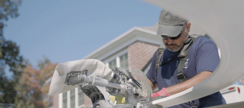 a professional providing services for an entry door replacement